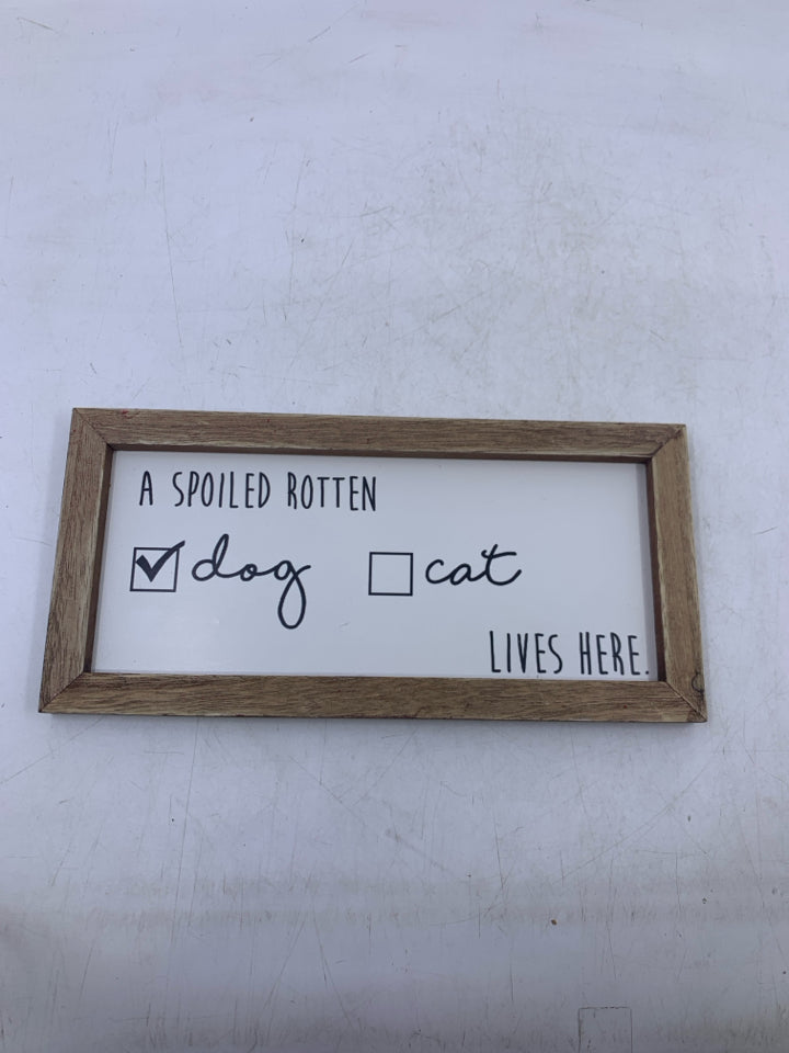 A SPOILED ROTTEN WALL HANGING.