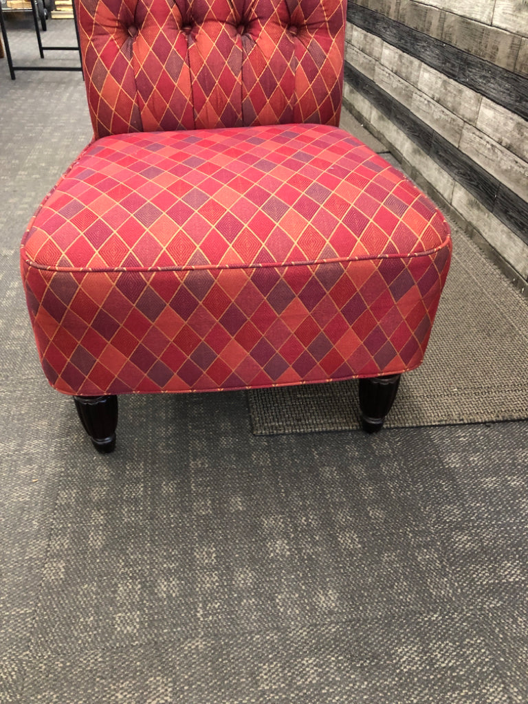 MULTI COLORED PRISM PATTERN FABRIC ACCENT CHAIR.