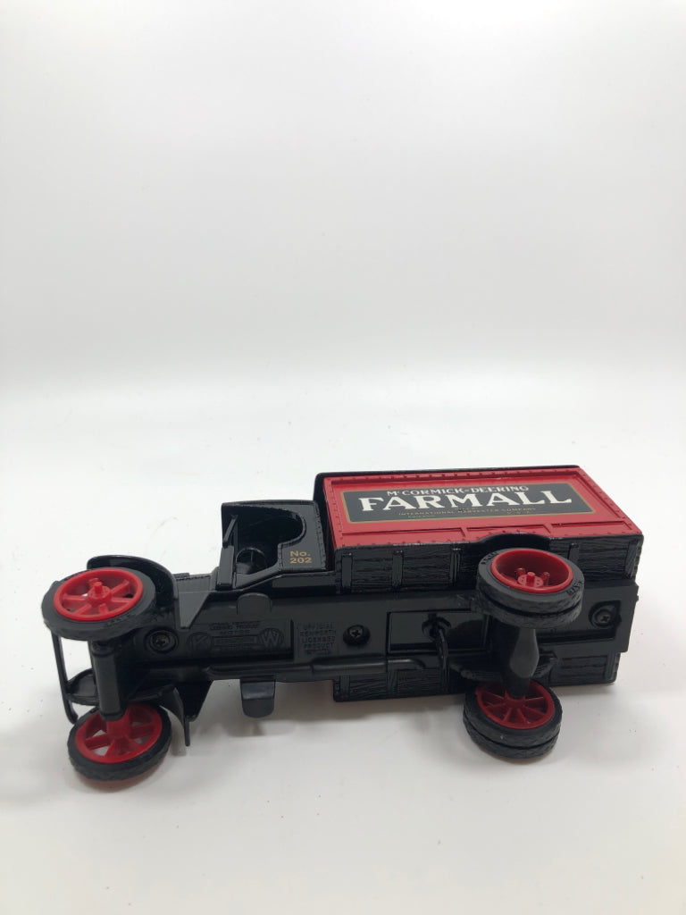 BLACK METAL TRUCK "FARMALL" BANK.