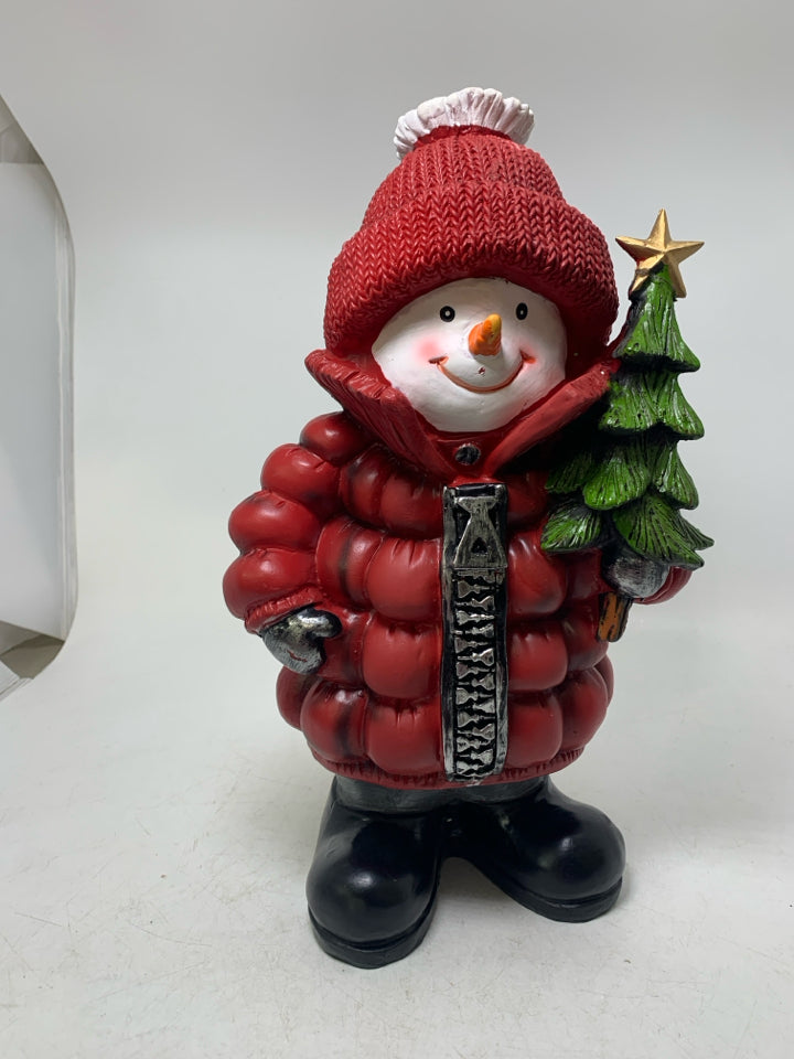 SNOWMAN IN RED PUFFER COAT HOLDING TREE.