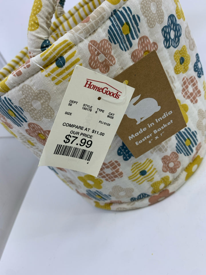 FLORAL FABRIC BIN W/YELLOW STRIPES ON INSIDE.