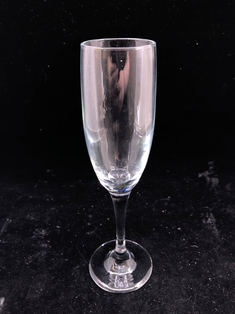 4 CLEAR CHAMPAGNE GLASSES.