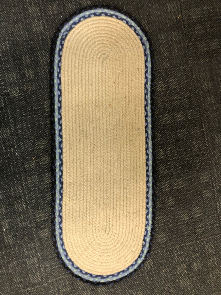 OVAL NARROW BRAIDED RUG W/ PAINTED BLUEBERRIES.
