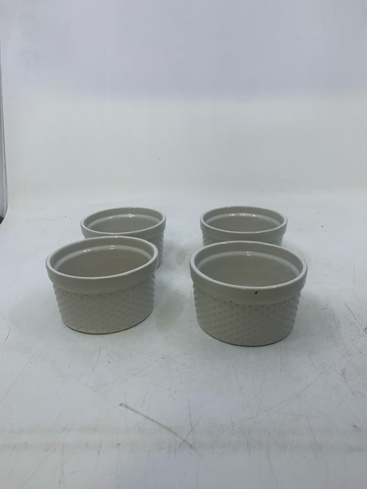 4 WHITE SINGLE BAKERS W/ EMBOSSED CIRCLES.