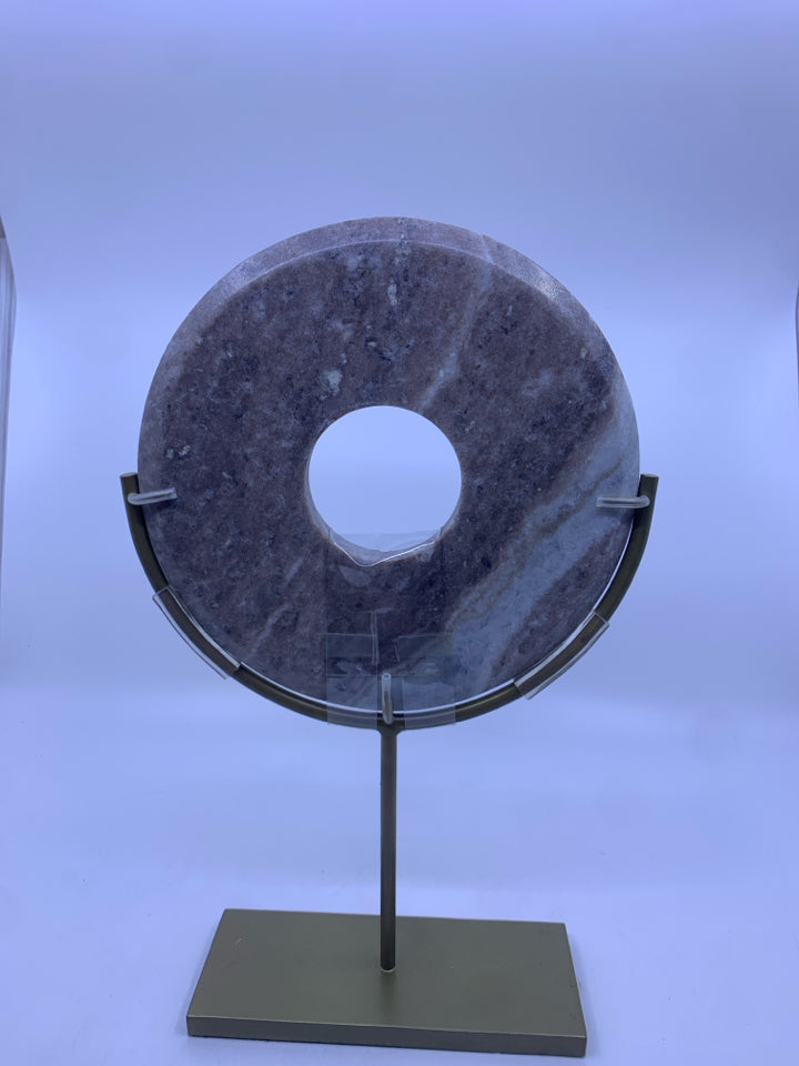HEAVY GREY MARBLE CIRCLE IN GOLD METAL STAND.
