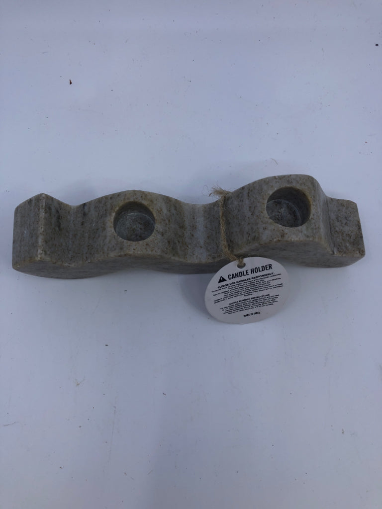 2 STONE WAVY TAPER CANDLE HOLDERS.