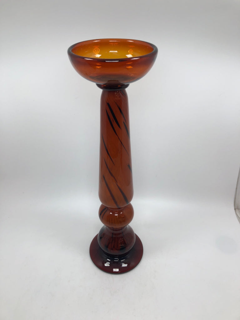 ORANGE BLOWN GLASS CANDLE HOLDER.