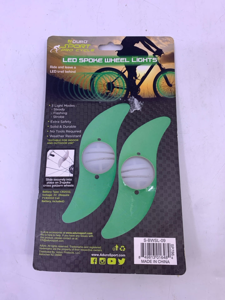 NIB GREEN LED BICYCLE SPOKE WHEEL LIGHTS.