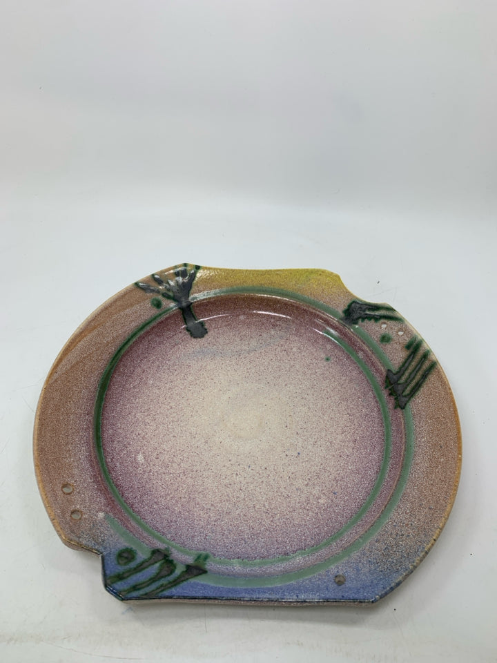 COLORFUL POTTERY PLATTER W/ DARK GREEN DETAILS.