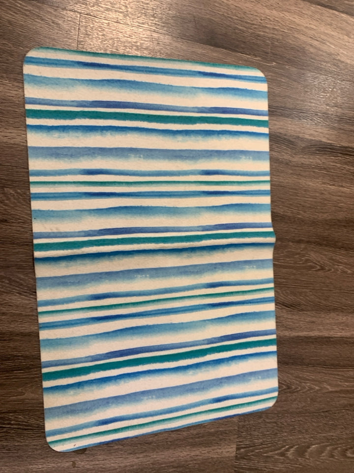 BLUE/GREEN STRIPPED SKID RESISTANT ACCENT RUG.