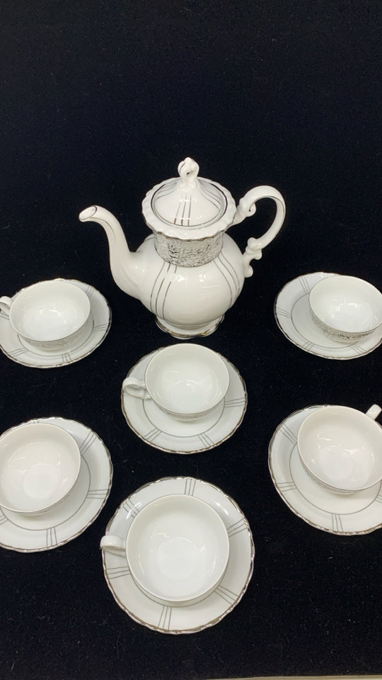 13PC FINE CHINA TEASET WHITE W/SILVER RIM.