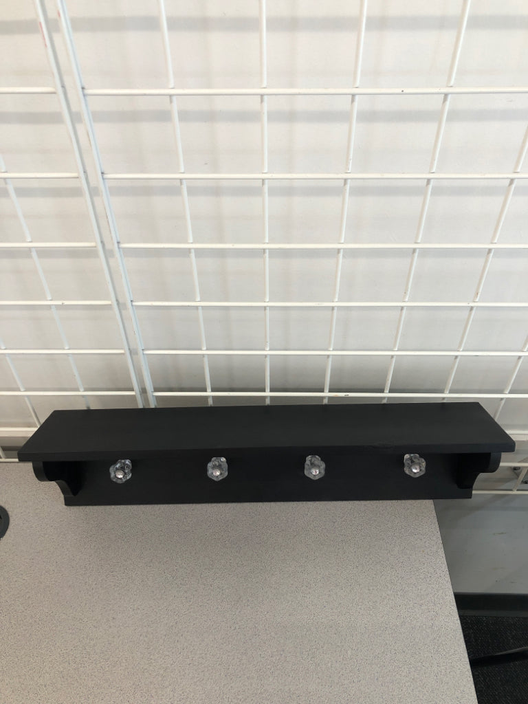 4 HOOK BLACK WALL SHELF W/CLEAR HOOKS.