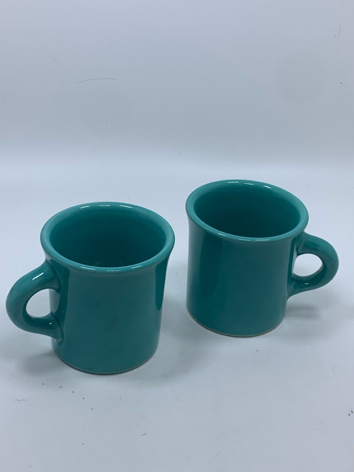 2 TEAL HLC DINER MUGS.