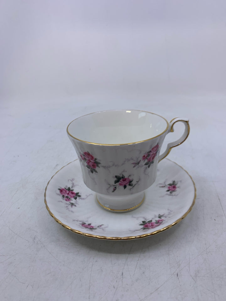 WHITE W/ PINK ROSES GOLD RIM.