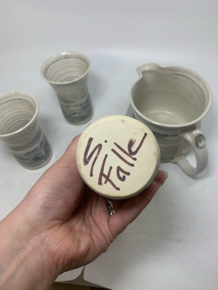 4 PC MULTI COLORED STRIPED POTTERY CUPS W/ PITCHER.