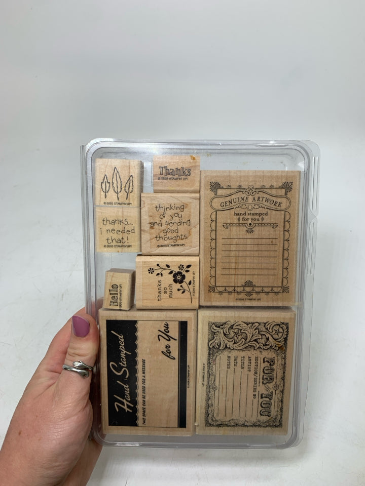 STAMPS IN CASE.