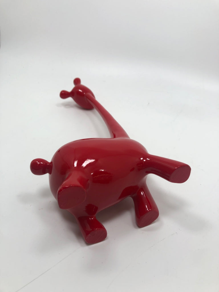 RED RESIN GIRAFFE SCULPTURE.