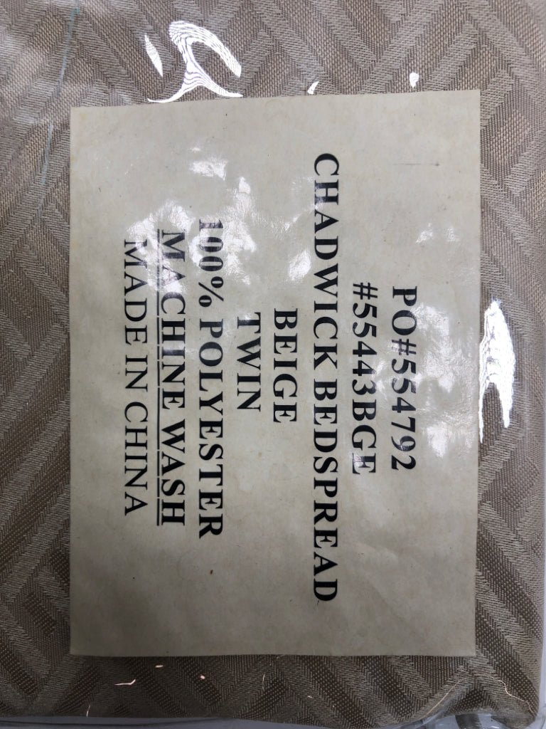 NIP BEIGE BEDSPREAD.