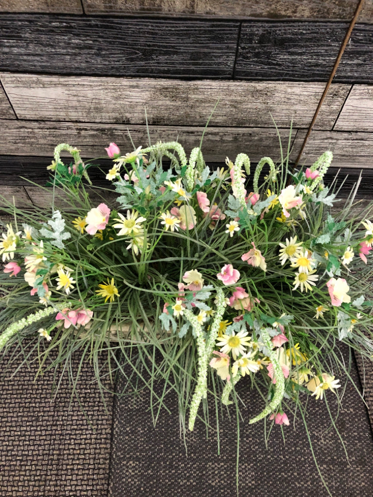 FAUX WILDFLOWERS IN HEAVY FAUX-STONE PLANTER.