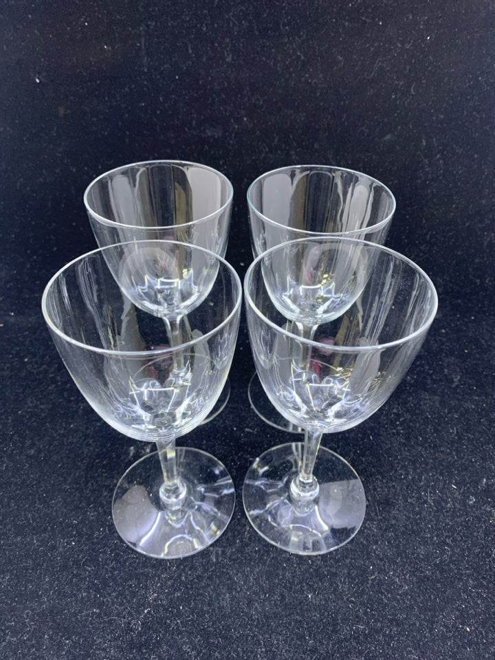4 SMALL FOOTED BRANDY GLASSES.