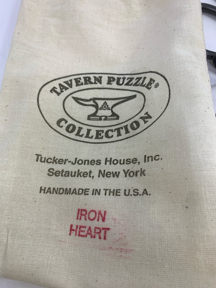 TUCKER JONES IRON HEART PUZZLE IN BAG.
