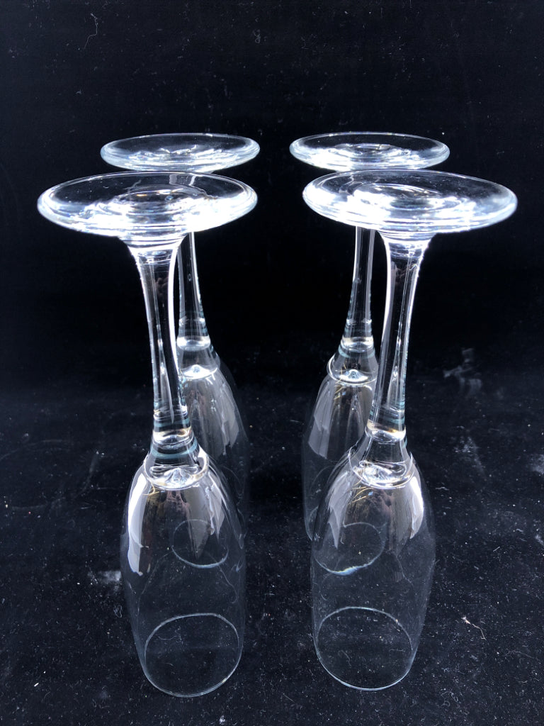 4 CLEAR CHAMPAGNE GLASSES.
