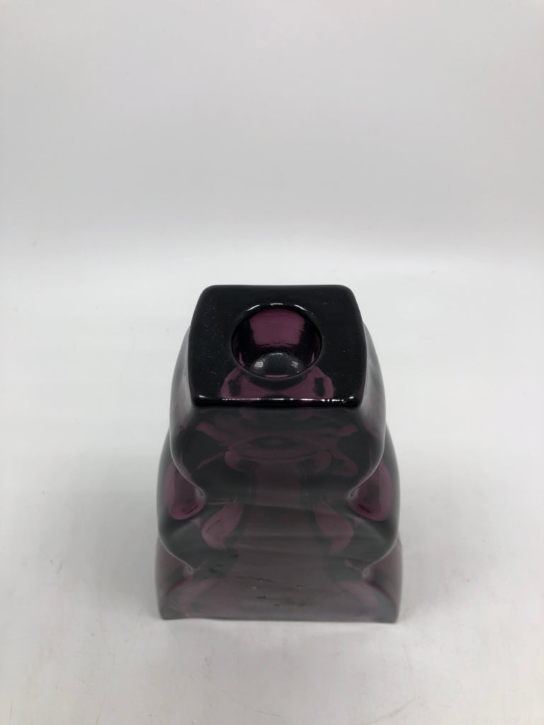 WAVY PURPLE GLASS CANDLE STICK HOLDER.