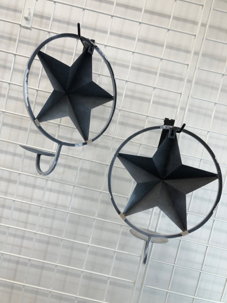 2 WHITE STAR METAL CANDLE HOLDER.