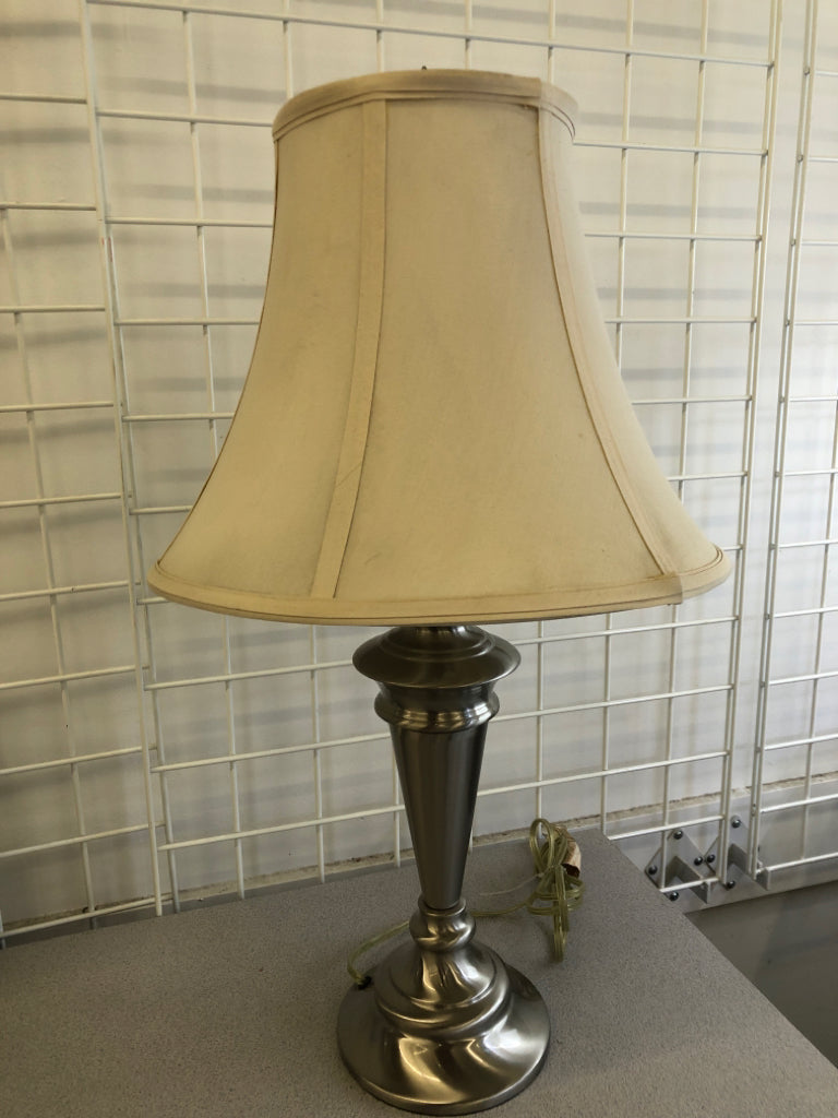 SILVER BASE, TAN SHADE TABLE LAMP.