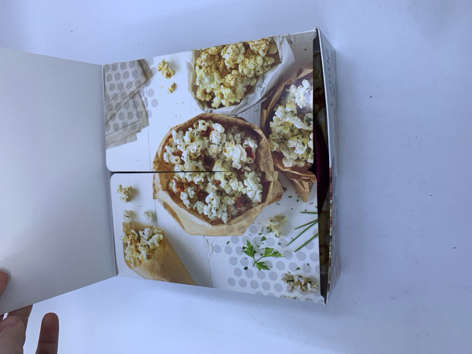 NIP PINK SILICONE COLLAPSIBLE MICROWAVE POPCORN MAKER.