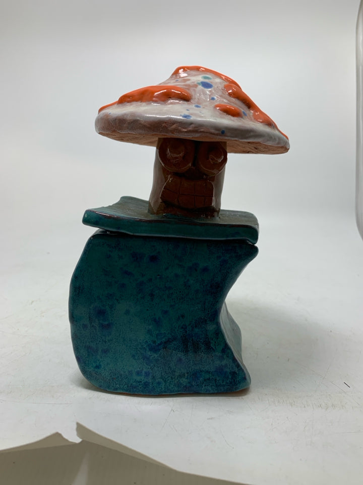 HOME MADE BLUE CANISTER W/ MUSHROOM TOP.