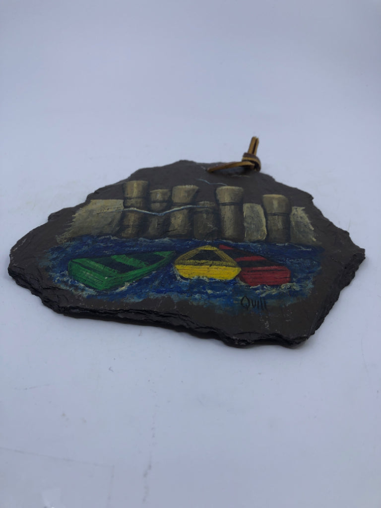 BROWN PAINTED SLATE W/ 3 COLORED BOATS WALL HANGING.