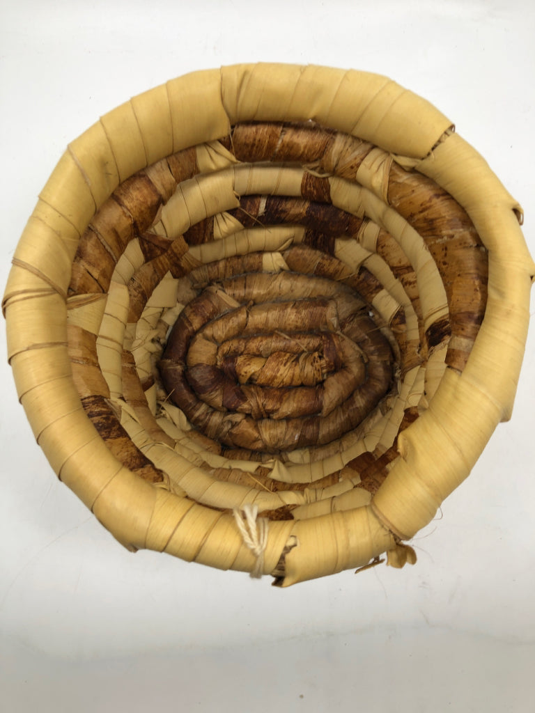 NWT ROUND WOVEN BASKET MADE IN HAITI.