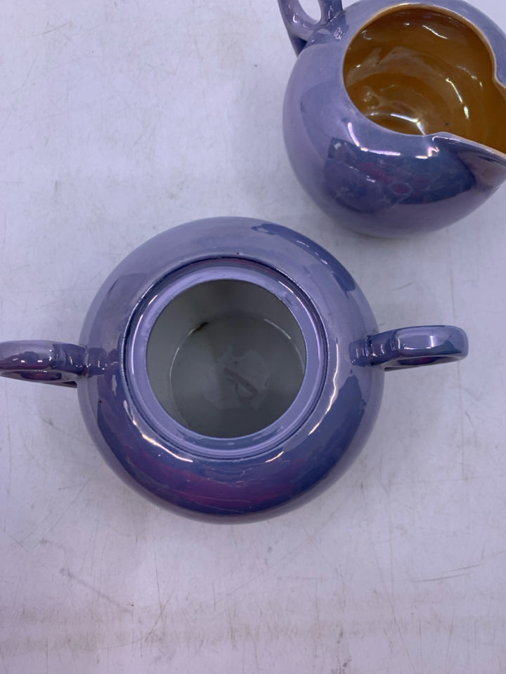 BLUE IRIDESCENT W/ ORANGE INSIDE.