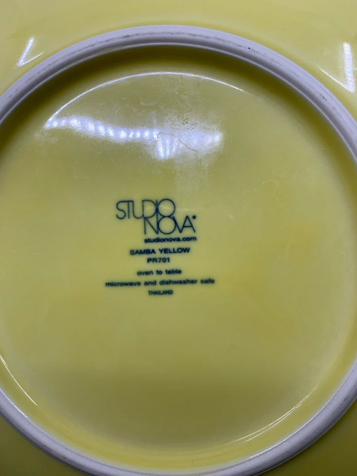 4 YELLOW DINNER PLATES W/ BROWN SWIRL.
