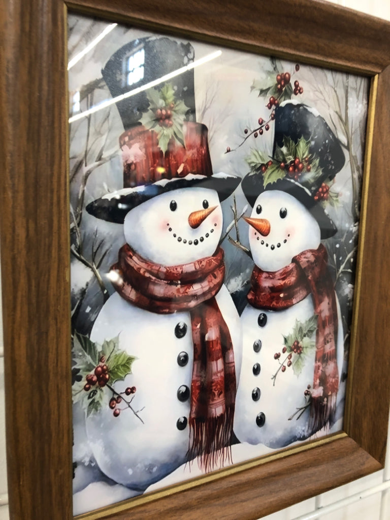 TWO SNOWMEN PRINT IN BROWN FRAME.