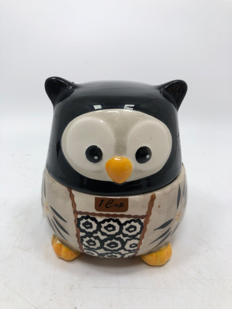 5PC COVERED OWL MEASURING CUPS.