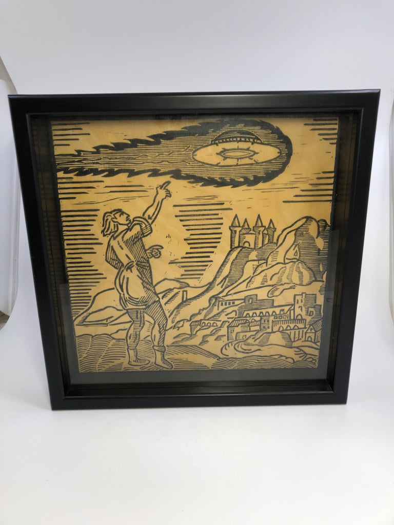 WOODCUT PRINT POINTING TO SKY IN BLACK SHADOWBOX.