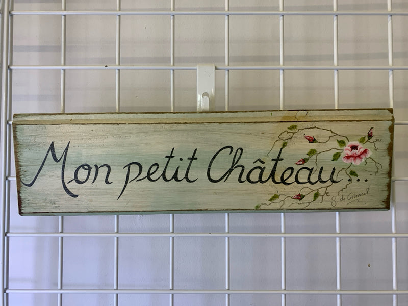 "MONPETIT CHATEAU" DISTRESSED W/ PAINTED PINK FLOWER WALL ART.