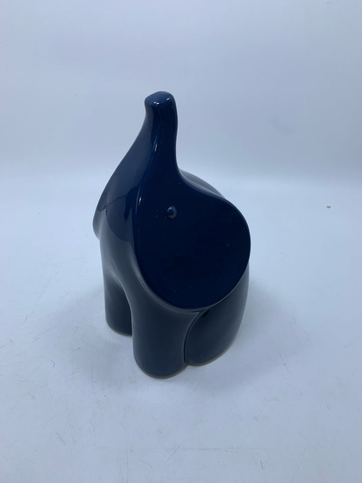 CERAMIC ELEPHANT W/ TRUNK UP.