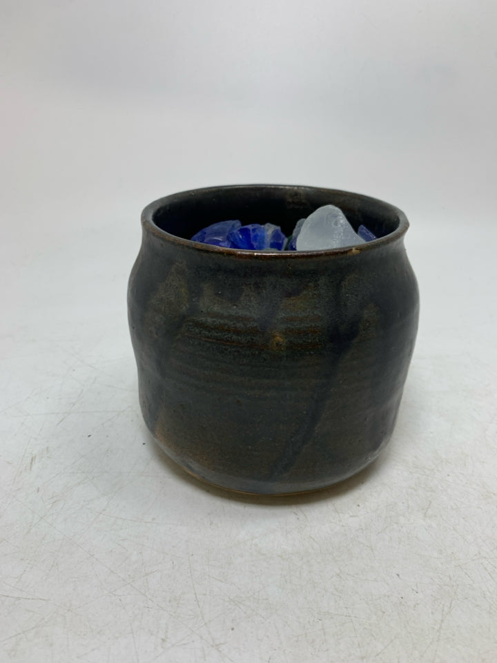 DARK PLANTER W/ PAINTED LIGHT HOUSE FILLER W/ SEA GLASS IN BAG.