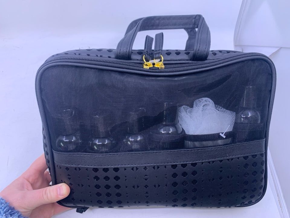 NEW BLACK W/ CUTOUTS COSMETIC TRAVEL BAG.