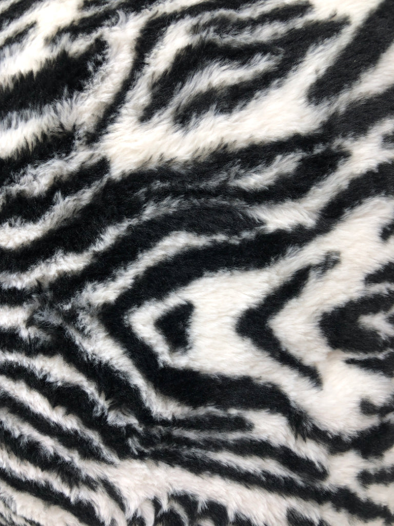 FUZZY ZEBRA ACCENT PILLOW.