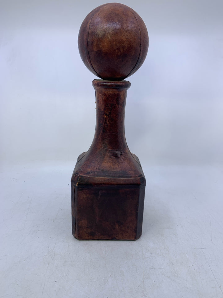 DARK LEATHER WRAPPED DECANTER W/ LARGE STOPPER.