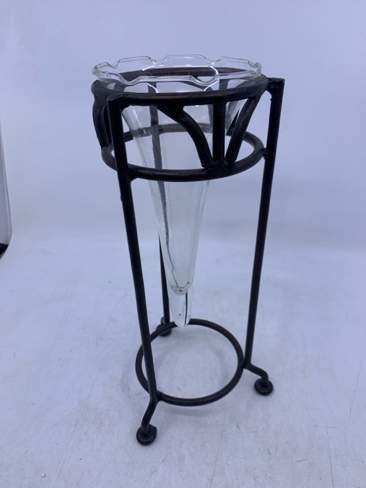 METAL STAND W/ GLASS VASE INSERT.