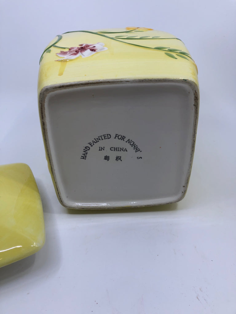 YELLOW FLORAL W BUTTERFLY CANISTER.