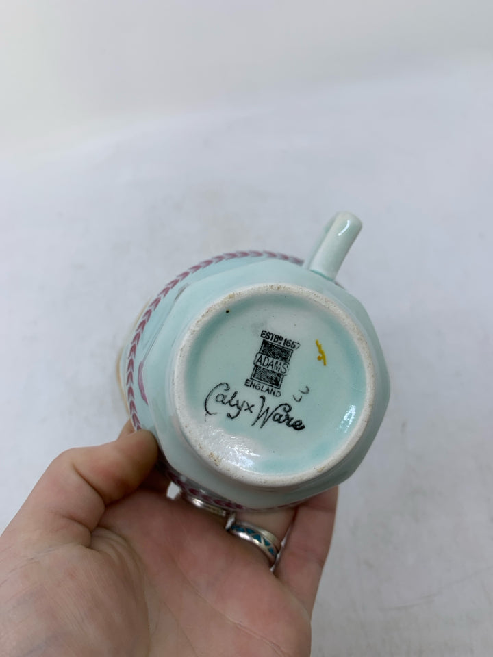 VTG LIGHTBLUE W/ PINK DETAILS + FLOWERS CALYX CARE.