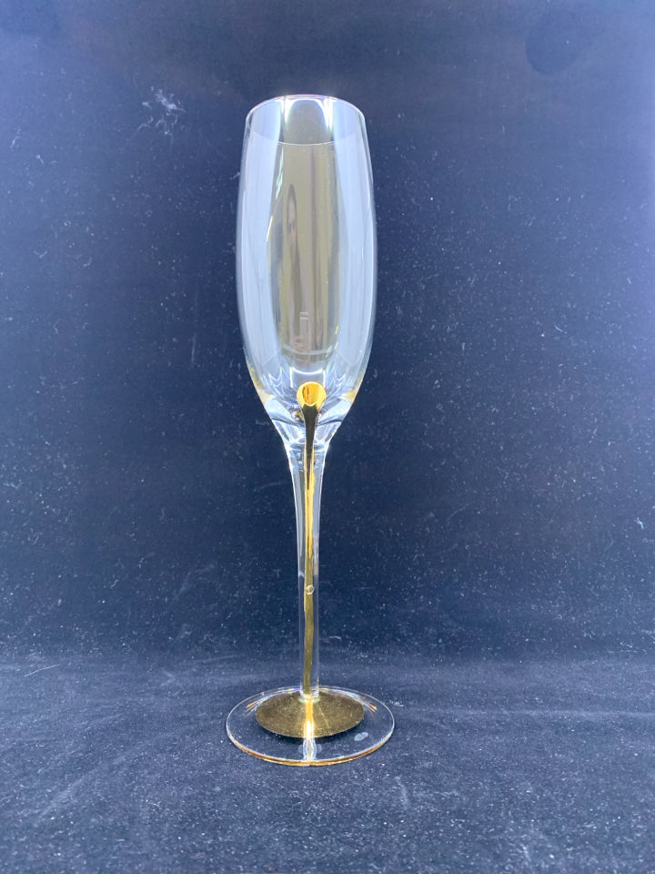 4 CHAMPAGNE FLUTES W/ GOLD.
