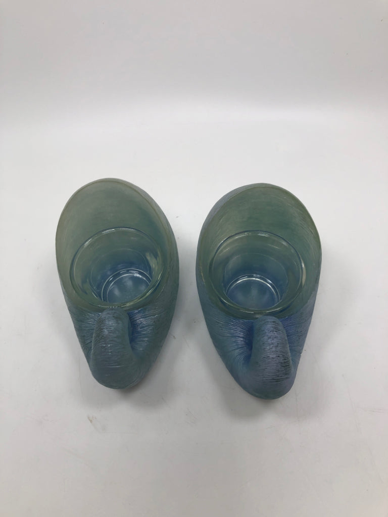 2 BLUE GLASS SEASHELL VOTIVE HOLDERS.