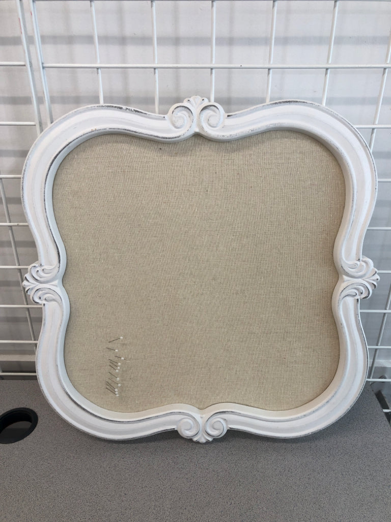 WHITE WOOD MEMO BOARD W/ATTACHED PINS.